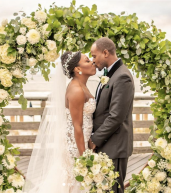 Bride and Groom with an Arbor
